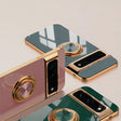 the iphone is a gold and green case