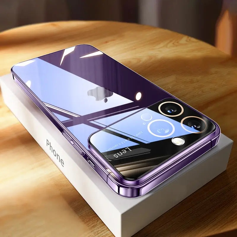 a purple iphone with a white box on a wooden table