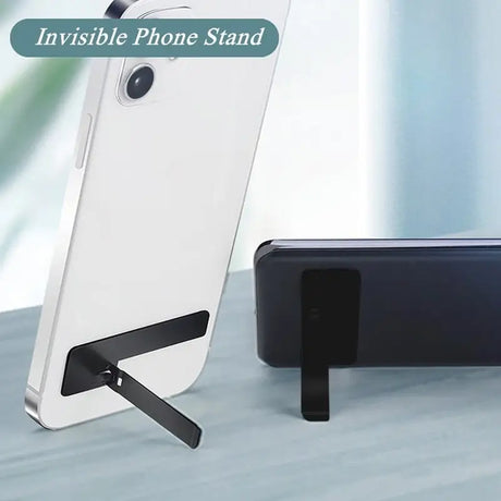 an iphone and a phone stand on a table