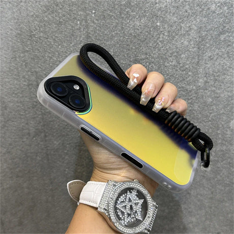 Iridescent phone case with black wrist strap.