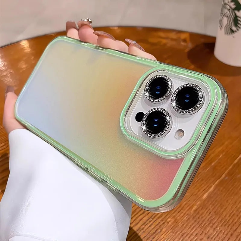Iridescent phone case with jeweled camera lenses.