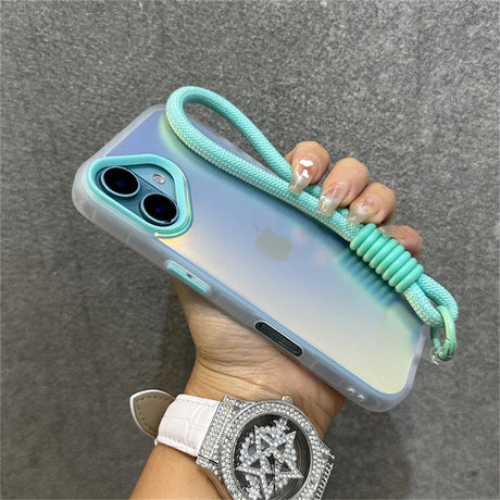 Iridescent phone case with mint green accents and wrist strap.