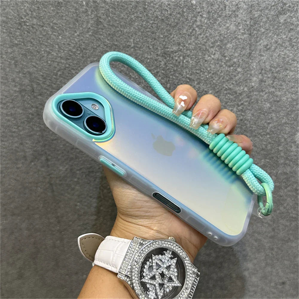 Iridescent phone case with mint green accents and wrist strap.