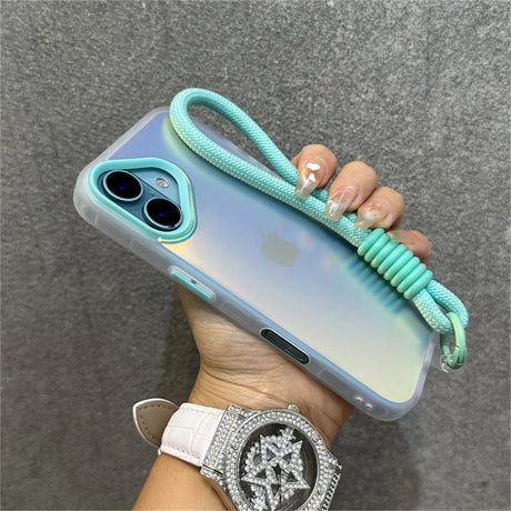Iridescent phone case with mint green accents and wrist strap.