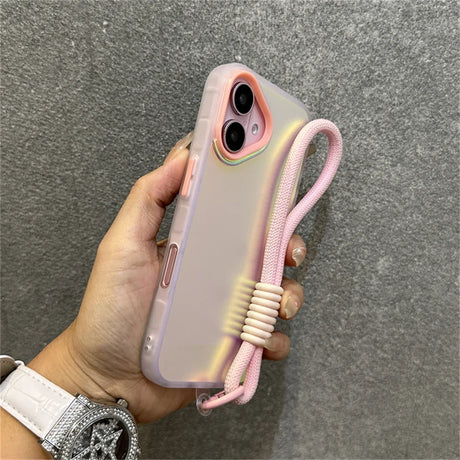 Iridescent phone case with pink wrist strap.