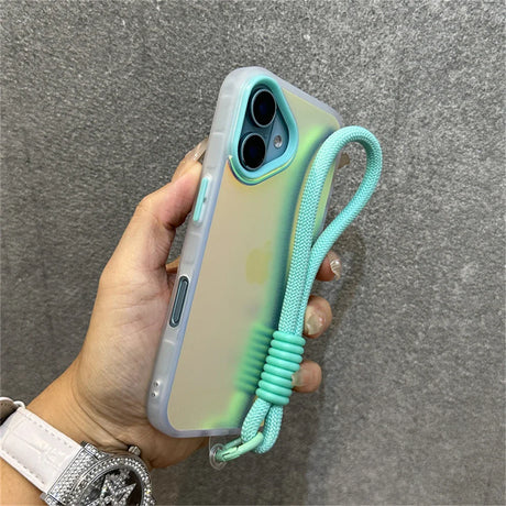 Iridescent phone case with turquoise wrist strap.