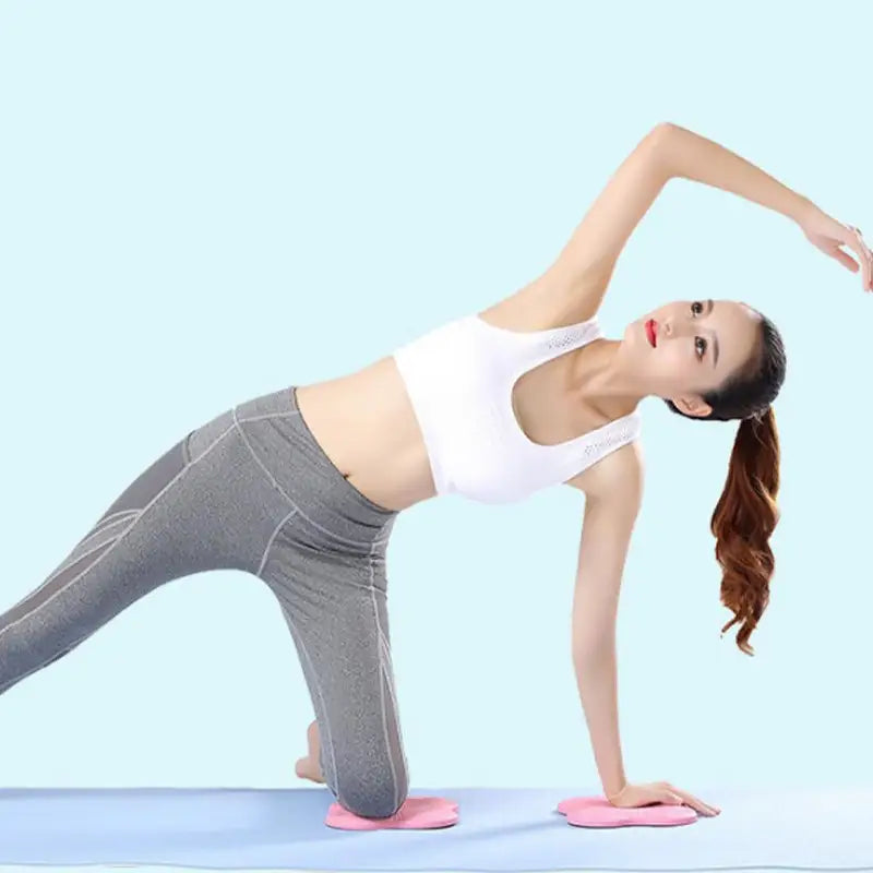 a woman doing a yoga pose