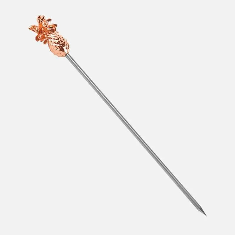a metal stick with a flower on it