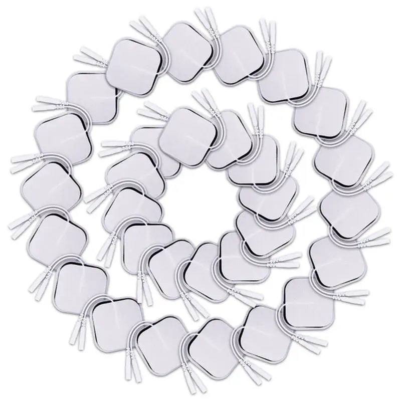 a circle of white plastic heart shaped forks