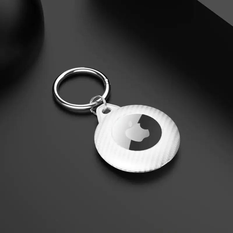 a white keychai with a black background