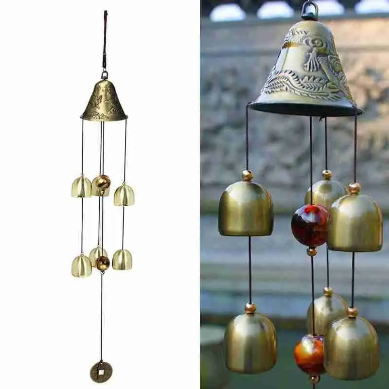a bell with bells hanging from it