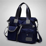 a blue bag with a zipper and two pockets