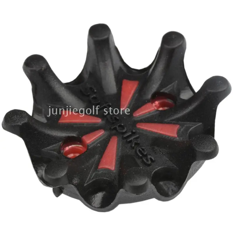 a black and red flower shaped plastic ring