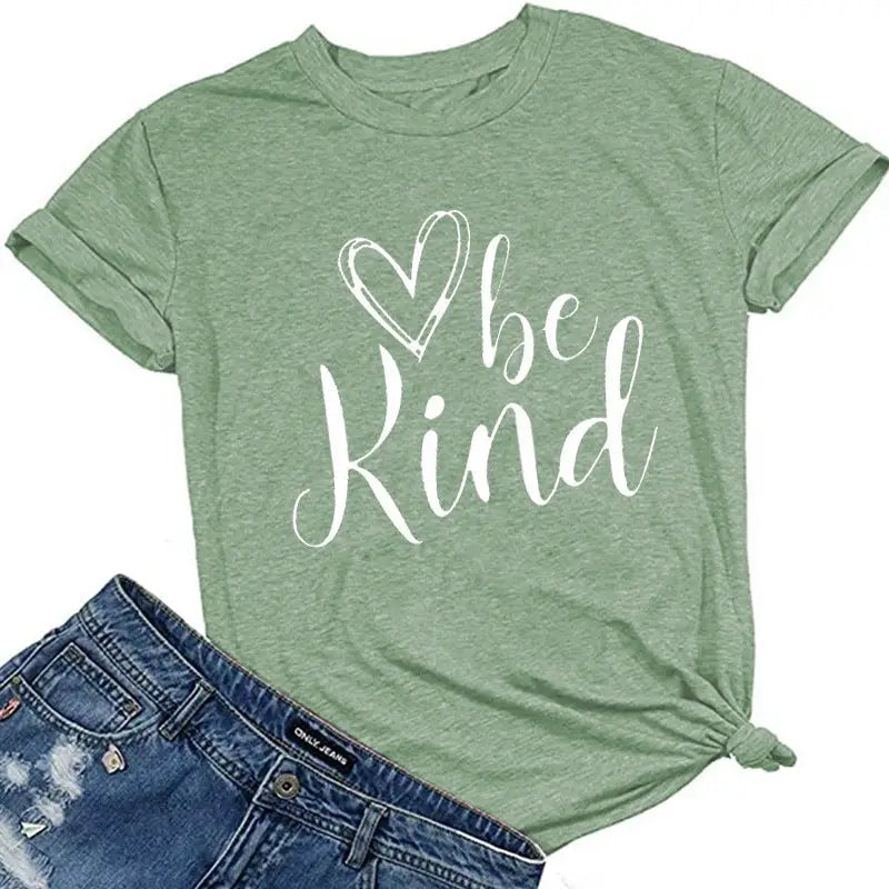a green shirt with the word be kind on it