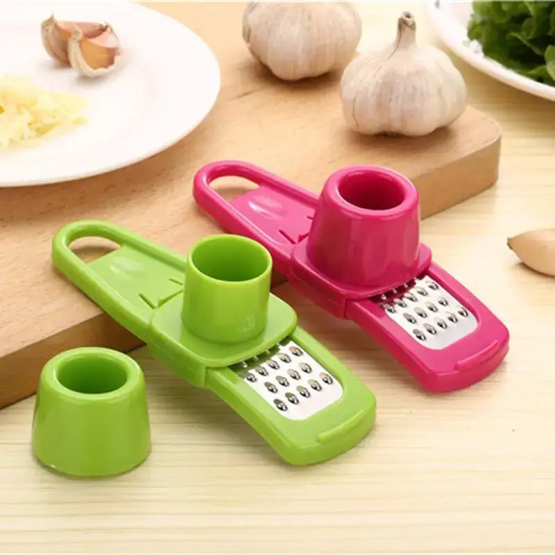 a kitchen knife and a knife cutter on a cutting board