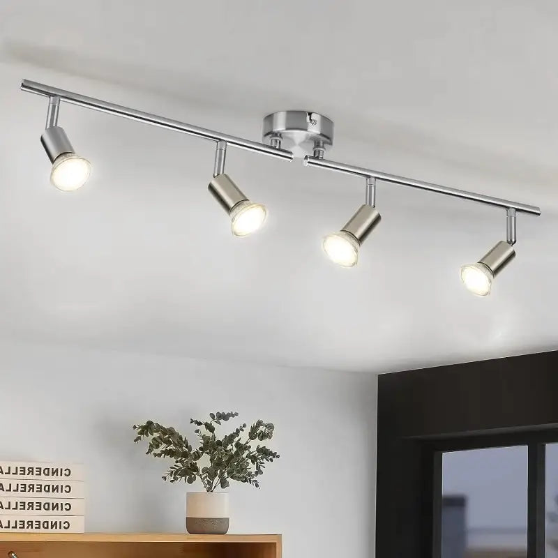 A kitchen light with three lights on the ceiling