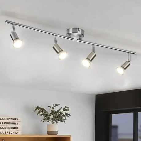 a kitchen light with three lights on the ceiling