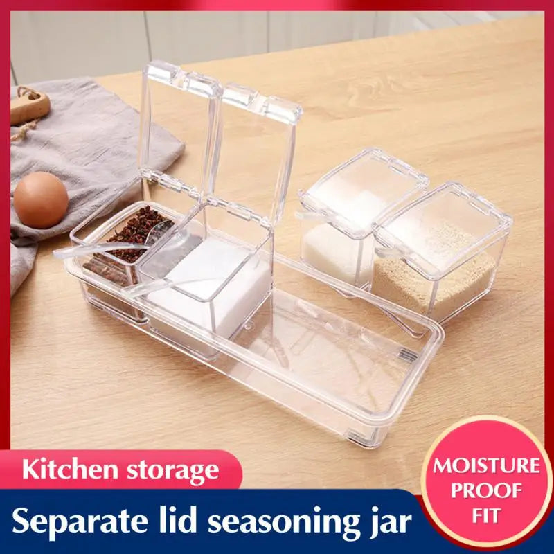 a kitchen storage box with a spoon and a knife