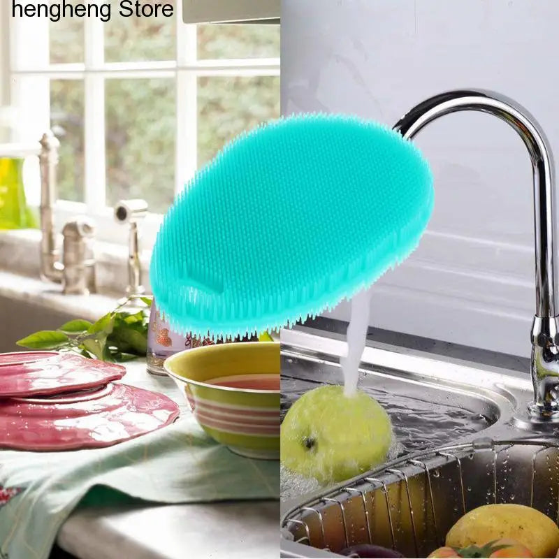 a kitchen sink with a green brush on it