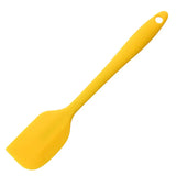 a yellow spat with a handle