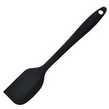 a black paddle with a wooden handle