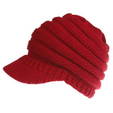 a red knit hat on a white background