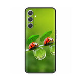 ladybird on a leaf with water droplet phone case