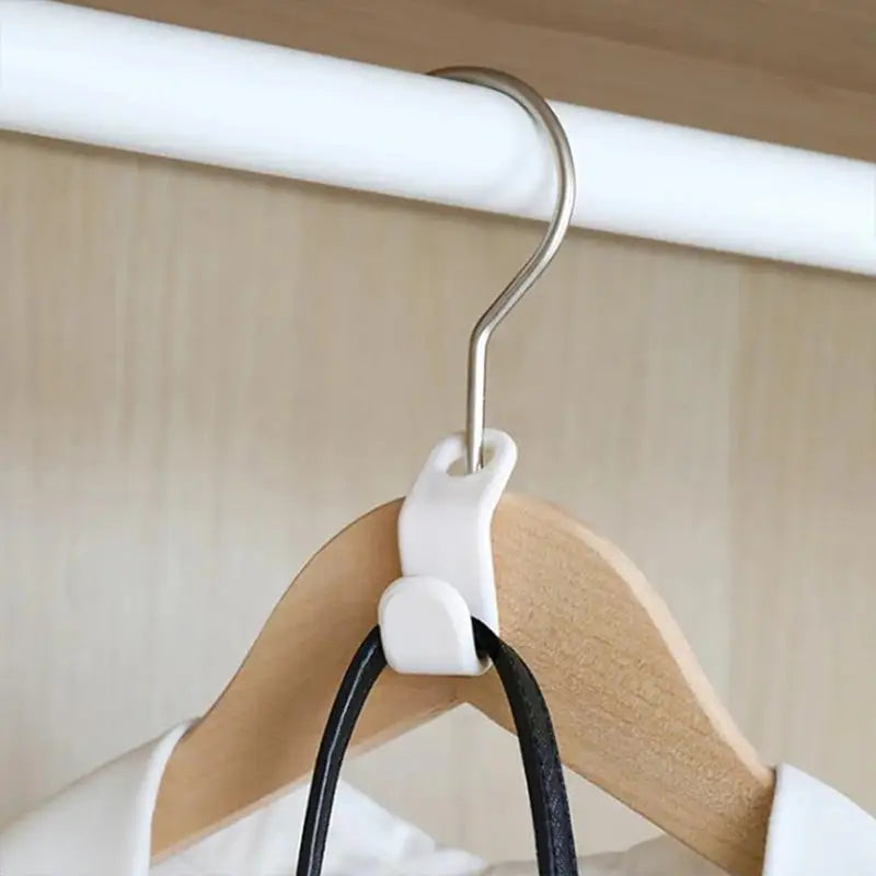 a wooden hanger with a white hanger on it