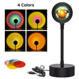 a lamp with four different colors and a black base