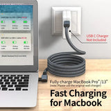 A laptop with a charging cable attached to it