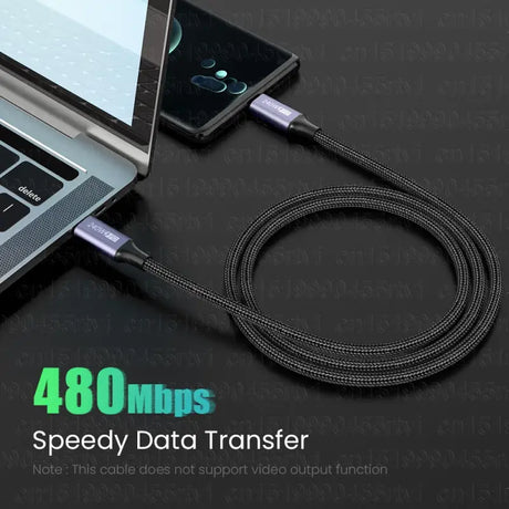 a laptop with a usb cable attached to it