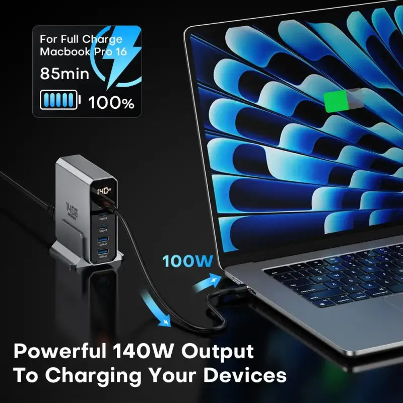 a laptop with a charging cable attached to it