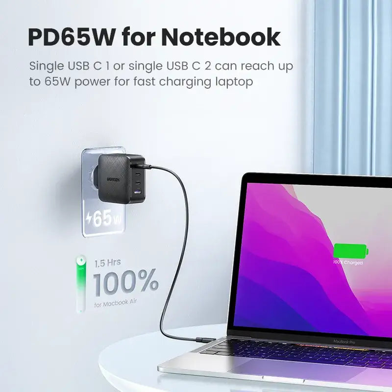 A laptop with a charging cable attached to it