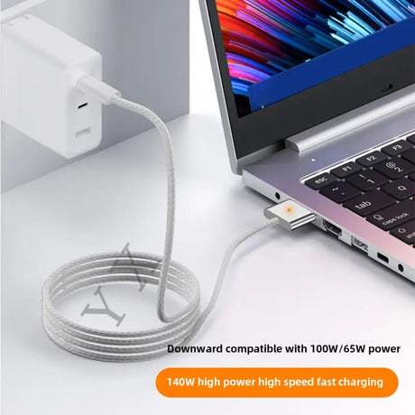 a laptop with a cable connected to it