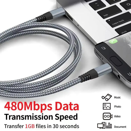 A laptop with a cable connected to it