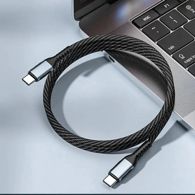 a laptop with a cable connected to it