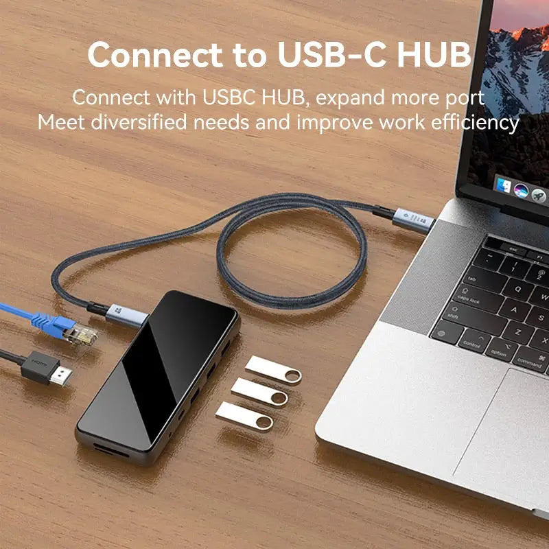 a laptop with a usb cable connected to it