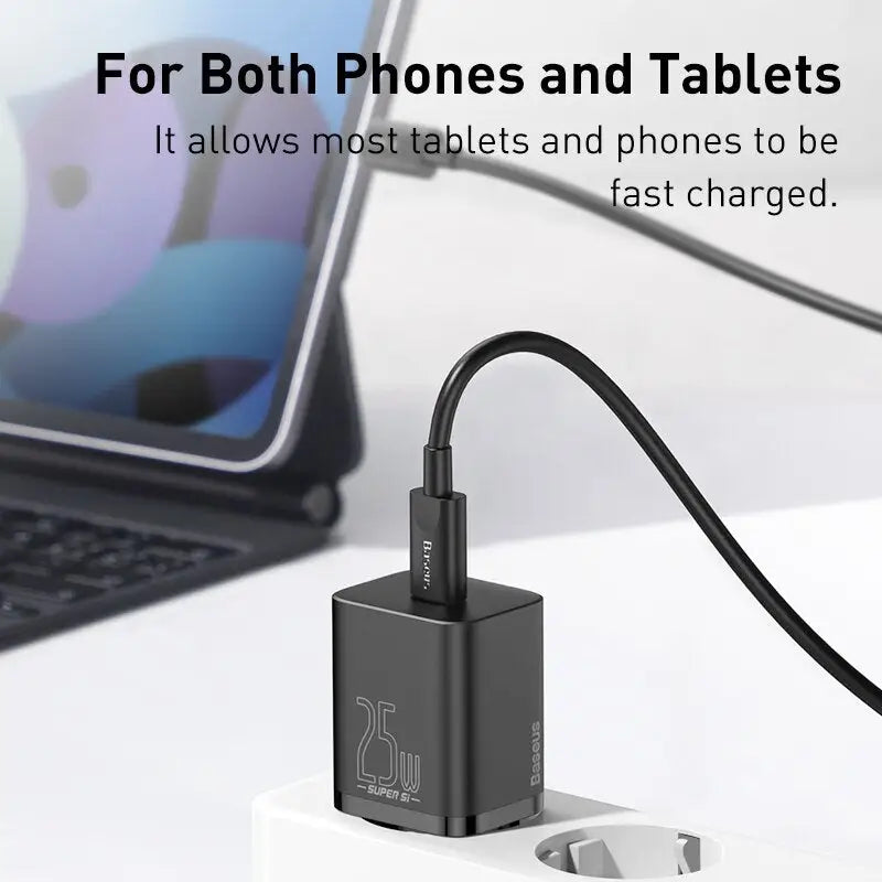 a laptop and a laptop with a cable connected to it