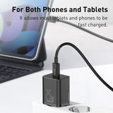 a laptop and a laptop with a cable connected to it