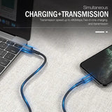 a laptop and a phone connected to a charger