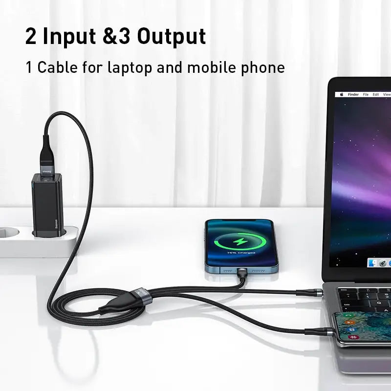 a laptop and a phone on a desk