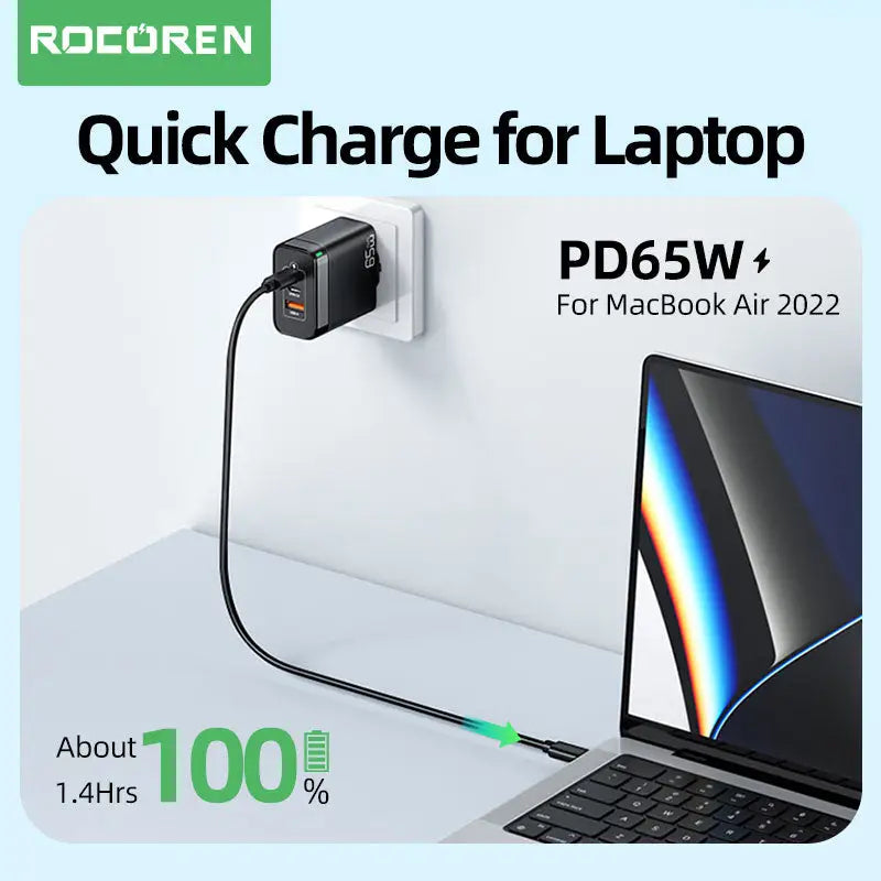 a laptop with a power cord attached to it