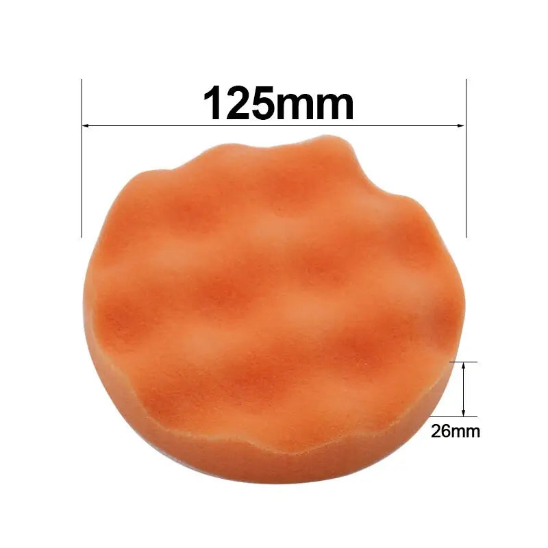 a large orange sponge with a white background