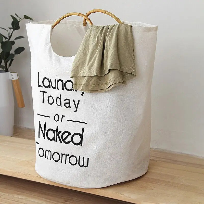a white laundry bag with a black lettering on it