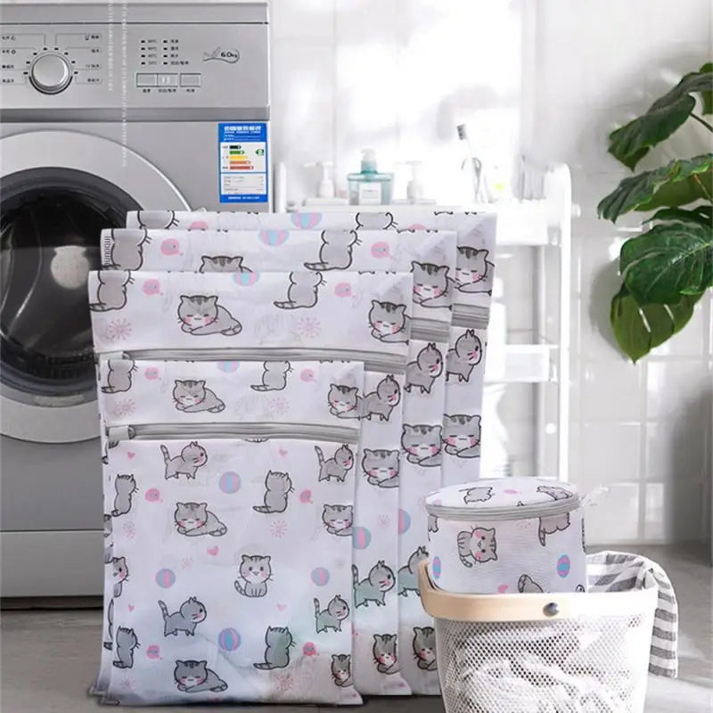 a laundry bag with a cat pattern on it