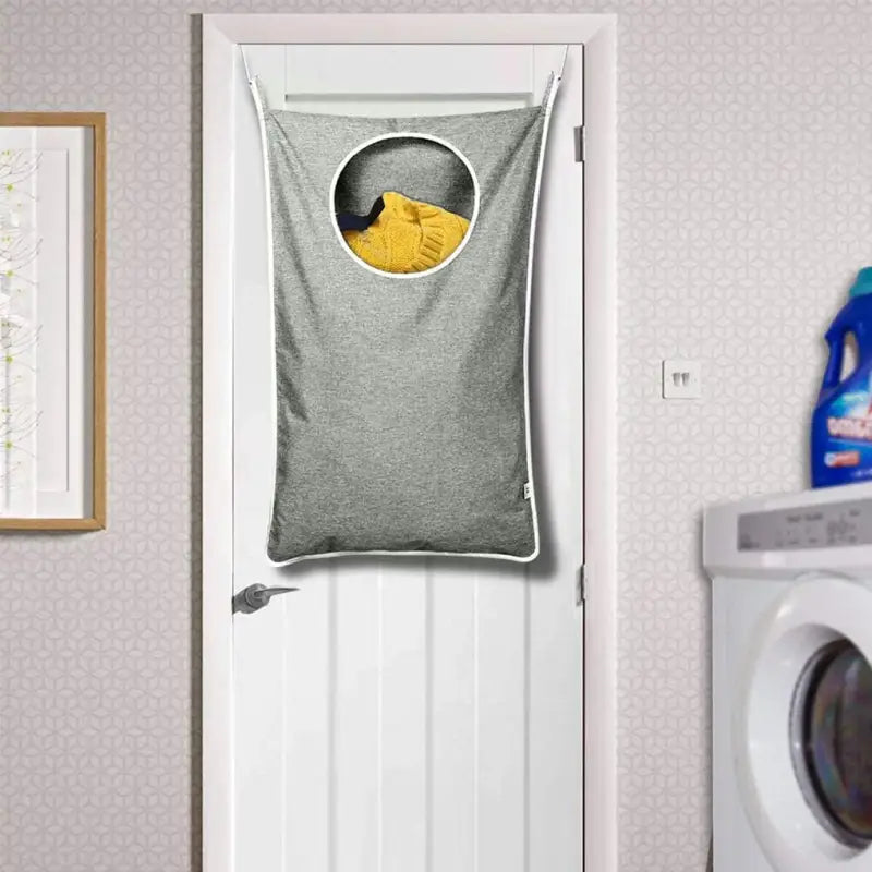 a laundry bag hanging on the door