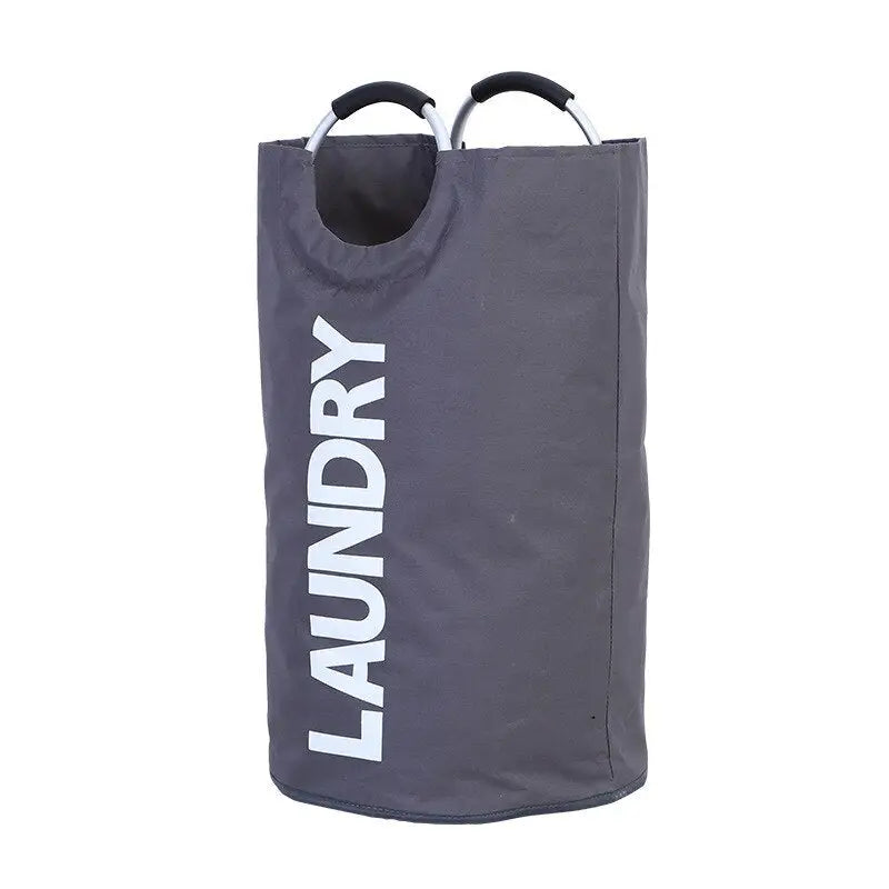 the laundry bag is a grey, fold bag with white lettering