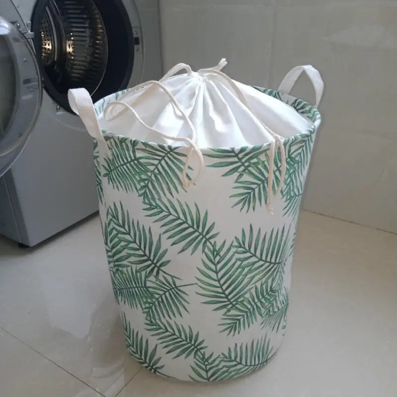 a laundry bag with a palm leaf print