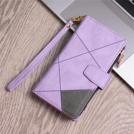 Lavender-colored wallet or phone case with geometric stitching and a wrist strap.