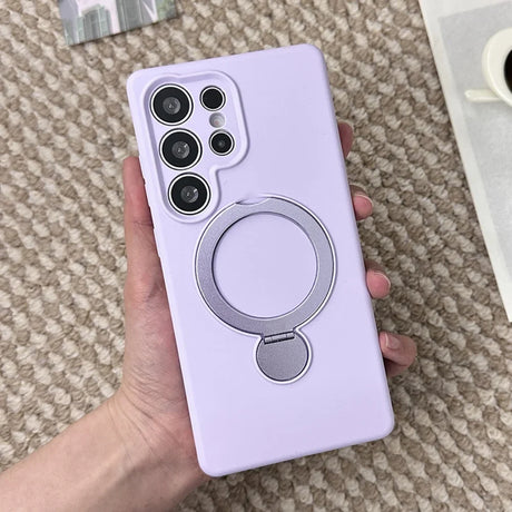 A lavender phone case with a silver ring holder.